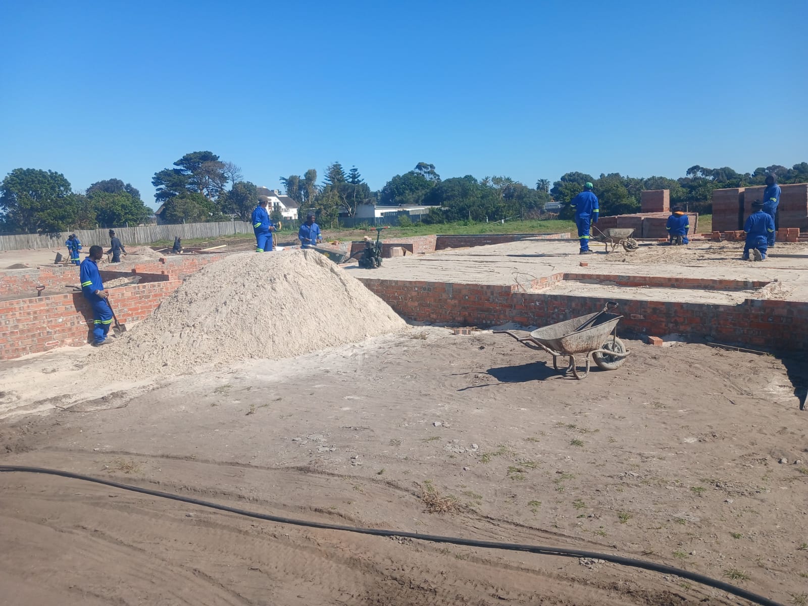 Tipper truck dumping sand