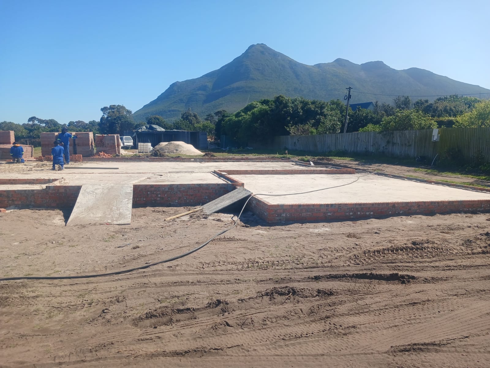 Site clearing by workers